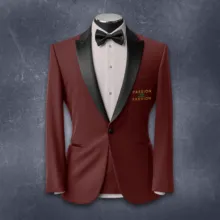 A formal maroon tuxedo with a black lapel and bow tie displayed against a textured gray background template. - PSD Mockup