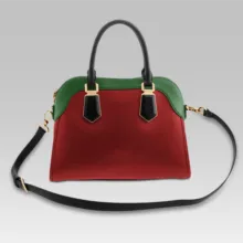 A red and green handbag mockup on a white background. - PSD Mockup