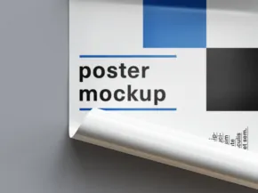 Corner of a poster mockup with blue and black design elements on a light gray background. - PSD Mockup