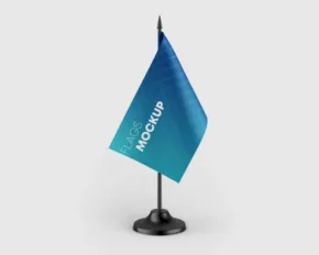 A mockup template of a blue and white flag on a black stand. - PSD Mockup