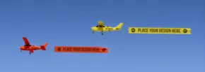Two small planes flying with advertising banners against a blue sky, serving as a perfect template for mockups. - PSD Mockup