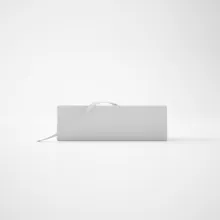 Minimalist mockup of a laptop half-closed on a white background. - PSD Mockup