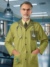A doctor standing confidently in a clinic with a stethoscope around his neck, showcasing a mockup. - PSD Mockup