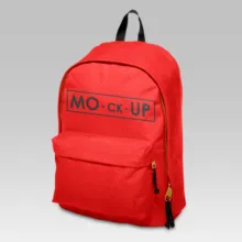 Red backpack with a mockup template on a gray background. - PSD Mockup