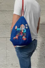 Person carrying a blue drawstring bag with a cartoon character mockup. - PSD Mockup