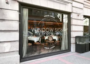 Storefront window with "mockup template" text, showcasing an example of advertisement placement. - PSD Mockup