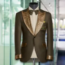 Elegant suit displayed on a mannequin with gold and brown accents, serving as a mockup. - PSD Mockup