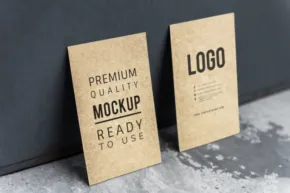Two business card mockups on a concrete wall. - PSD Mockup