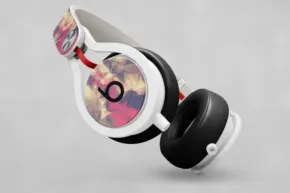 Custom-designed over-ear headphones with a colorful ear cup pattern and mockup template. - PSD Mockup
