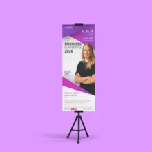 Mockup of a promotional stand displaying a woman speaker at a business event. - PSD Mockup