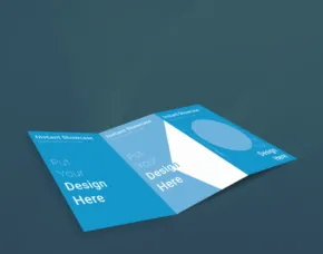 Three business cards with a blue design template laid out on a dark surface as a mockup. - PSD Mockup