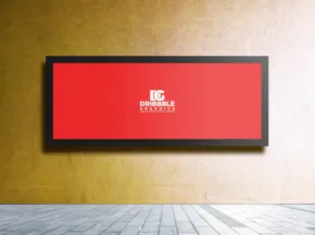 Rectangular red sign template with white "lg" logo centered, mounted on a textured yellow wall above a patterned floor. - PSD Mockup