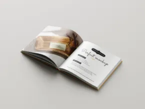 An open magazine on a plain surface, serving as a template, with one page showing an image of a guitar and another detailing various guitar types. - PSD Mockup