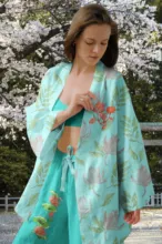 A woman wearing a blue kimono and pants mockup. - PSD Mockup