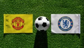 Soccer ball on grass flanked by Manchester United and Chelsea FC flags, serving as a template. - PSD Mockup