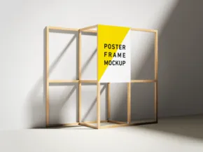A minimalist poster frame template displayed on a geometric shelving unit in a room with natural light shadows. - PSD Mockup