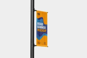 Street banner mockup fixed to a lamp post. - PSD Mockup