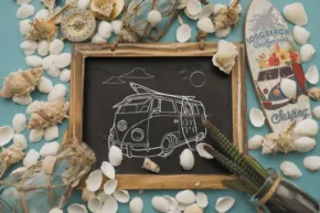 Vintage van chalk drawing on a blackboard surrounded by seashells, a surfboard keychain, and a mockup template on a turquoise background. - PSD Mockup