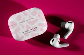Wireless earbuds with a floral patterned case mockup on a pink background. - PSD Mockup