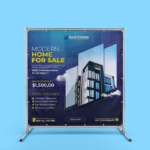 Real estate advertisement mockup for a modern home sale, displayed on a frame, against a blue background. - PSD Mockup