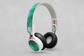 White and teal over-ear headphones mockup against a gray background. - PSD Mockup