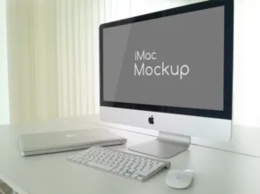 A modern workspace featuring an iMac with a "mockup" template on the screen, accompanied by a MacBook, keyboard, and mouse on a white desk. - PSD Mockup