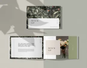 Various styled business cards templates displayed on a surface with shadows. - PSD Mockup