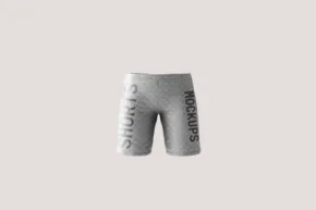 A template mockup of grey shorts with a logo on them. - PSD Mockup