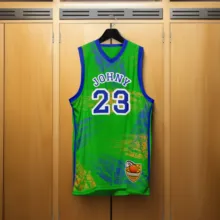 A green and blue basketball jersey template on a swinger. - PSD Mockup