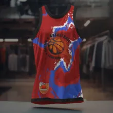 A red and blue basketball jersey mockup displayed in a store. - PSD Mockup