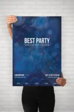 A woman holding up a best party poster mockup. - PSD Mockup