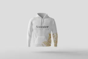 A mockup of a white hoodie with a gold design. - PSD Mockup