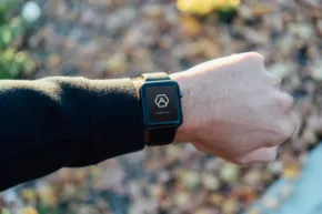 A person's wrist with an apple watch on it, perfect for a template or mockup. - PSD Mockup