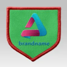 A green shield with the word brandname on it, serving as a mockup template. - PSD Mockup