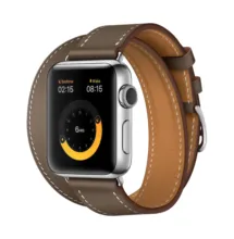 A mockup of an apple watch with a brown leather strap. - PSD Mockup